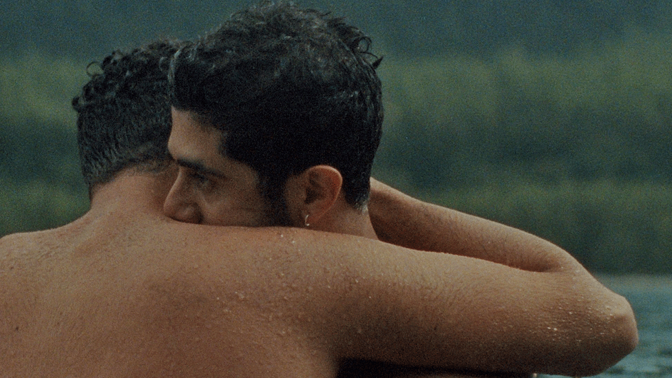 A photo from the film showing two people embracing