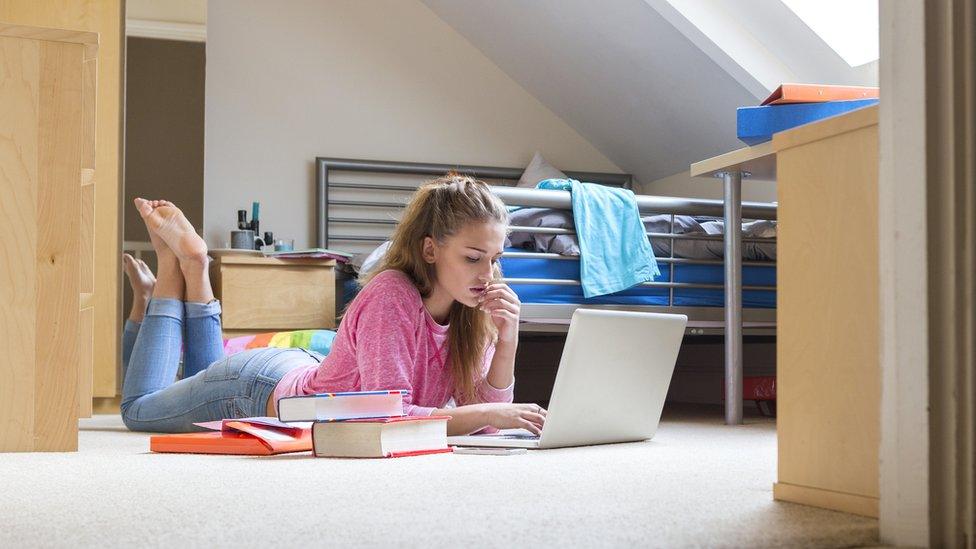 Student in room (posed by model)