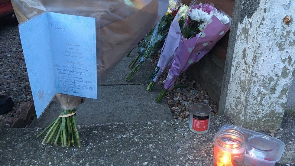 Tributes at scene