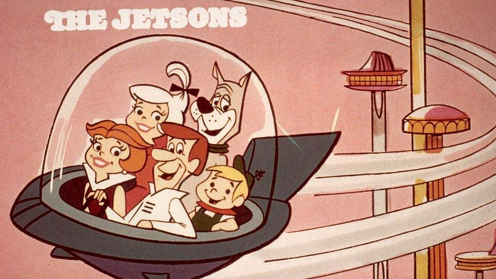 The Jetsons in their flying car