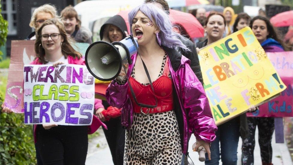 Strip club dancer Celia Lister protests with other demonstrators to oppose moves to close a branch of Spearmint Rhino in Sheffield