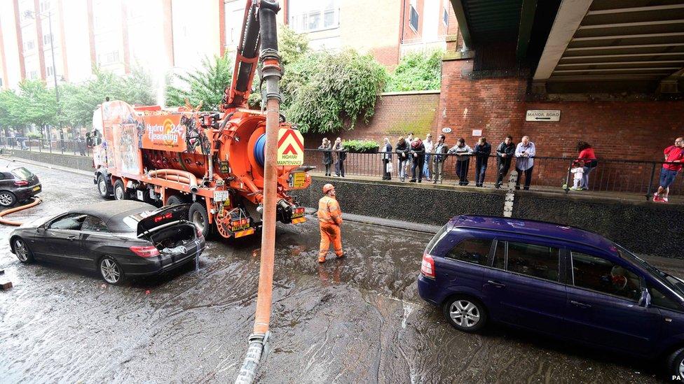 Water is pumped away from Manor Road in Wallington