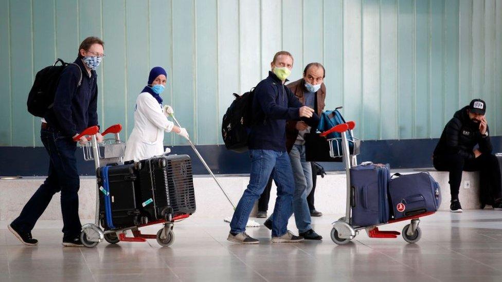 People at an airport