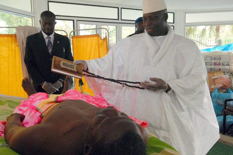 Yahya Jammeh waving the Koran over an HIV patient in 2007