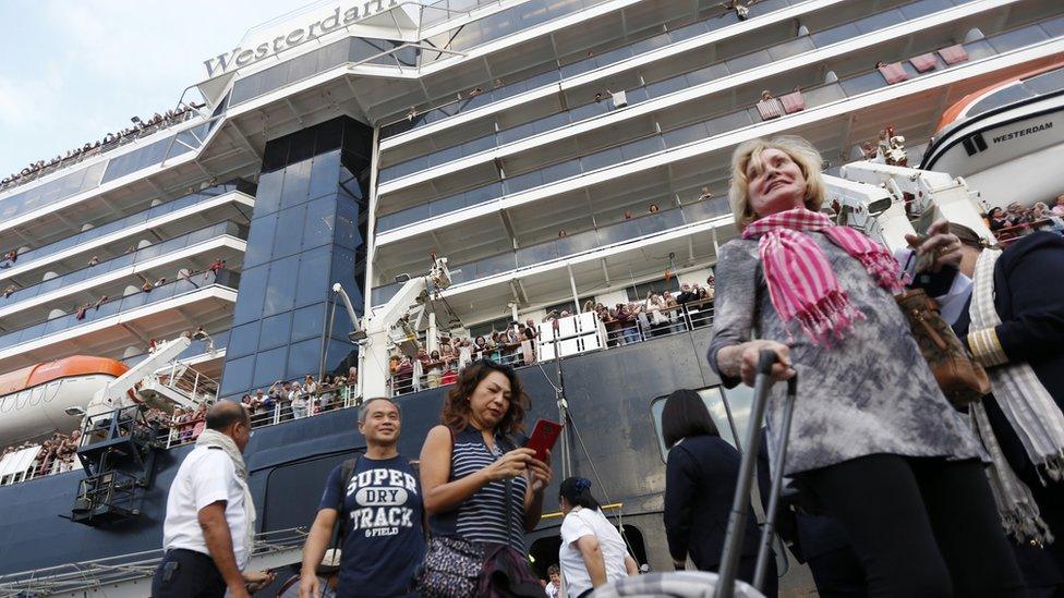 Passengers leaving the Westerdam