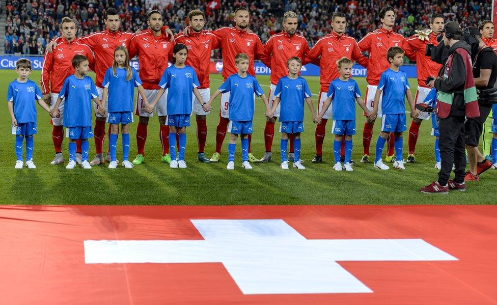 Swiss team sing anthem on 5 Sept in Basel for Euro 2016 match v Slovenia