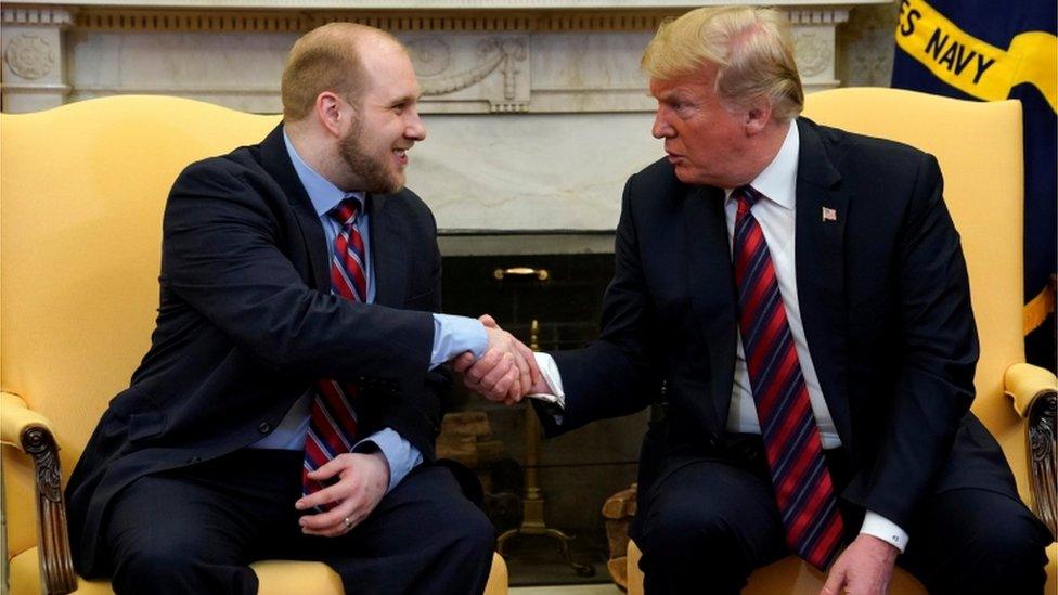 Josh Holt shakes hands with President Trump