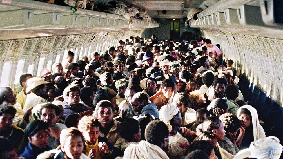 Ethiopian Jews sit on board an Israeli air force plane flying them from Addis Ababa to Tel Aviv on 25 May 1991