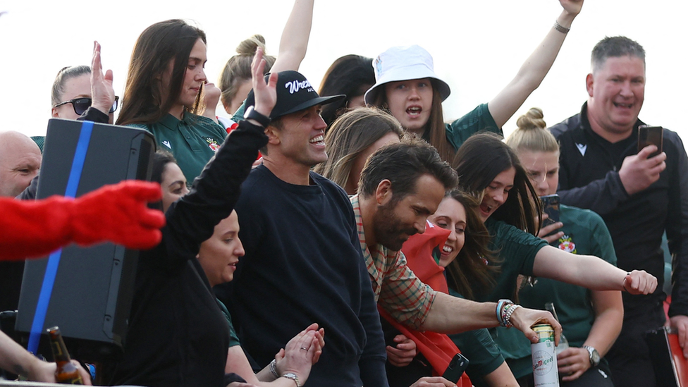 Wrexham's womens' team, Ryan Reynolds, and Rob McElhenney looked as though they thoroughly enjoyed the parade