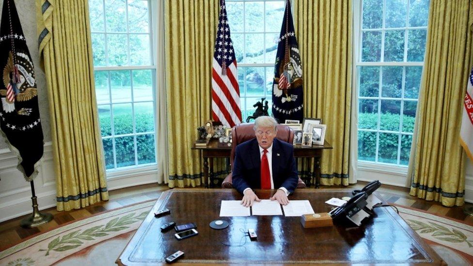 President Donald Trump in the Oval Office, 29 April 2020