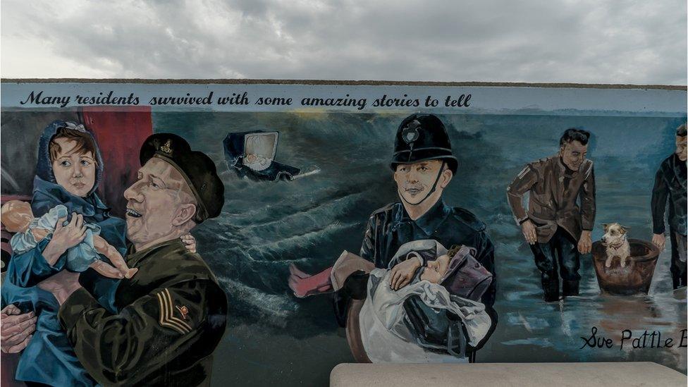 Canvey's sea wall has several murals portraying the 1953 flood