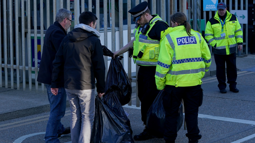 Former P&O workers collect their belongings after being fired