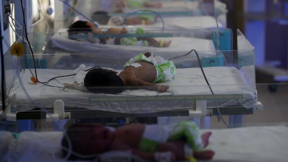 In this photograph taken on April 26, 2016, newly born babies lie in a maternity ward at a government hospital in Gwalio