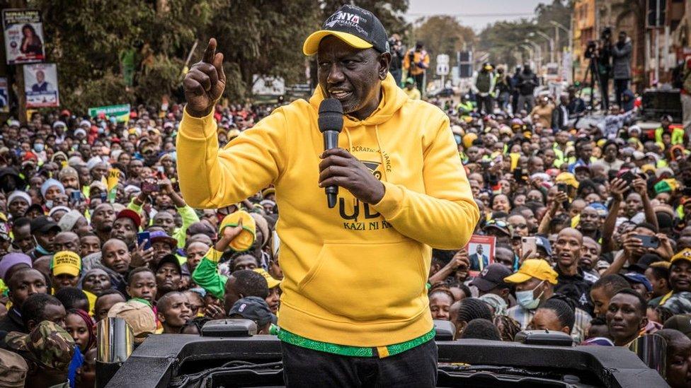 Kenya's Deputy President and presidential candidate William Ruto of Kenya Kwanza (Kenya first) political party coalition speaks to supporters from a car during his rally in Thika, Kenyaon August 3, 2022 in Thika, Kenya