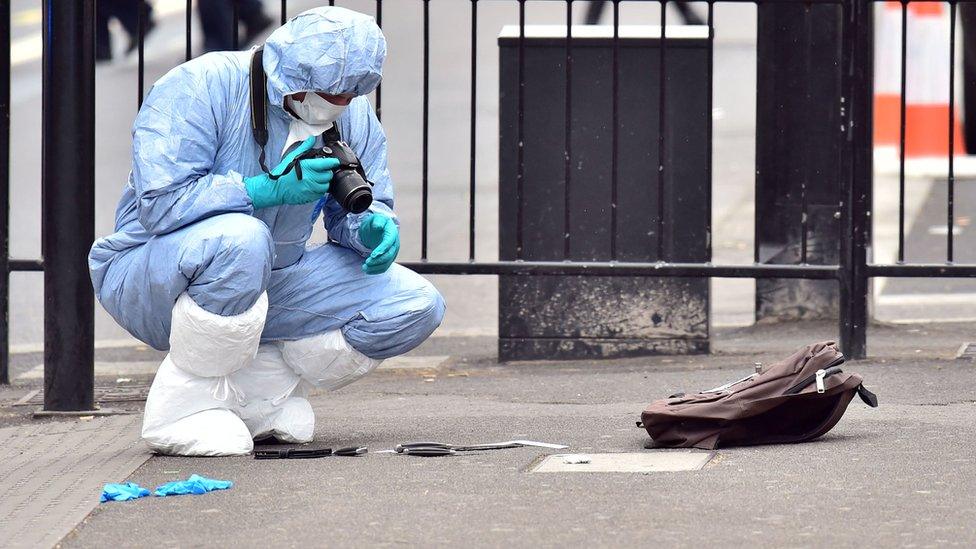 Police photographer in Whitehall