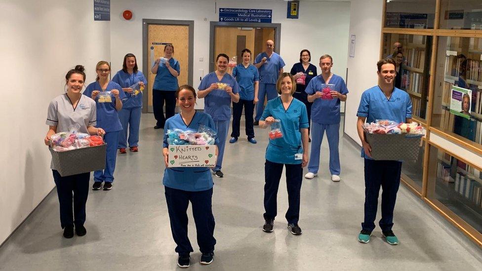 ICU staff with boxes of hearts