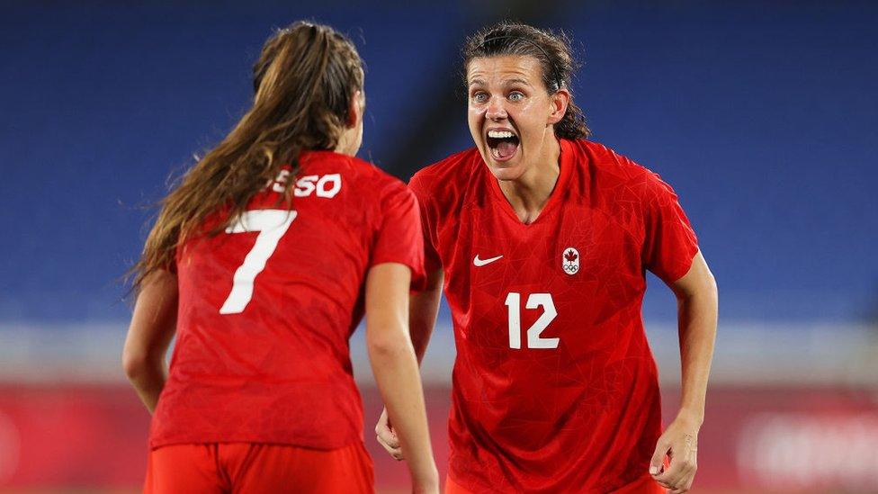 Christine Sinclair #12 of Team Canada celebrates with Julia Grosso #7 following their team's victory in the penalty shoot out in the Women's Gold Medal Match between Canada and Sweden