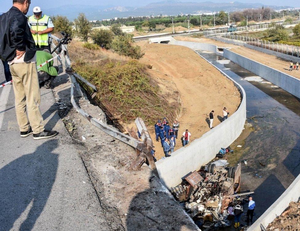 The lorry crashed through a barrier and plunged 20m