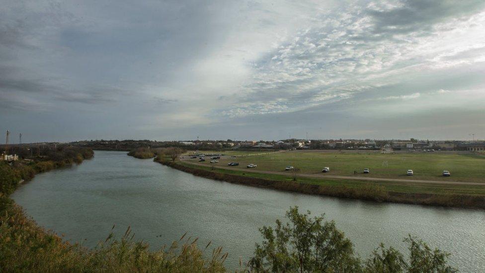 US immigration agents are seen on the US side of the southern border