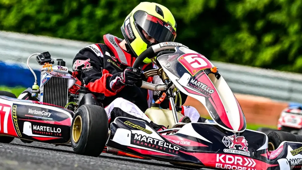 Euan Stephenson racing in a kart