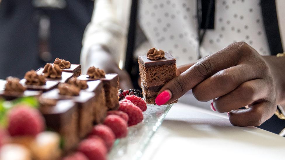 Woman eating cake