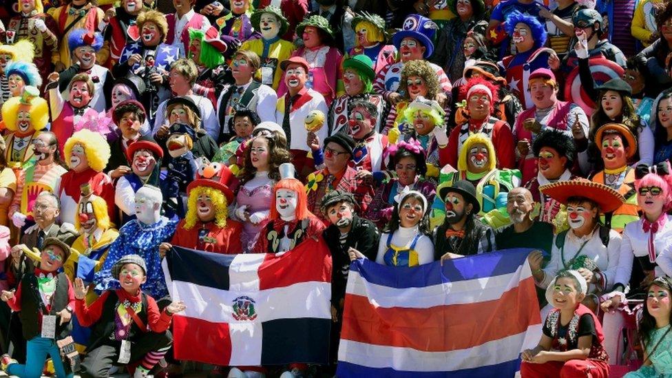 Clowns posing for group picture