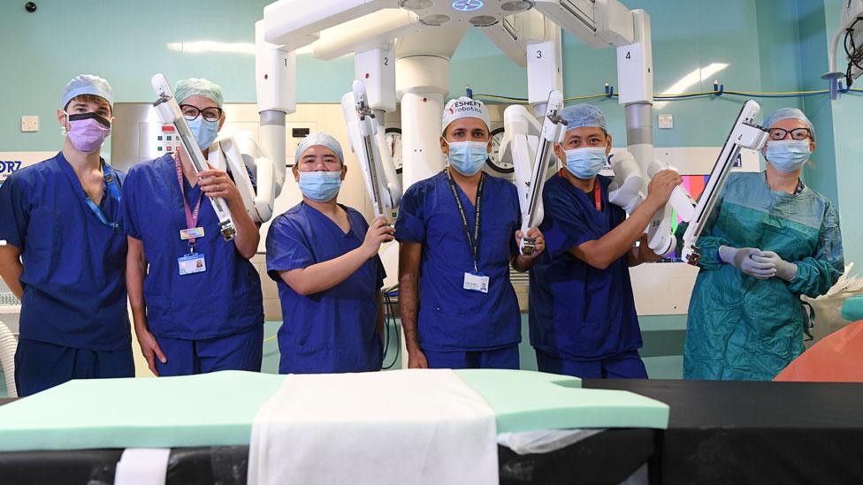 Surgical staff in front of a Da Vinci Xi robot at Colchester Hospital