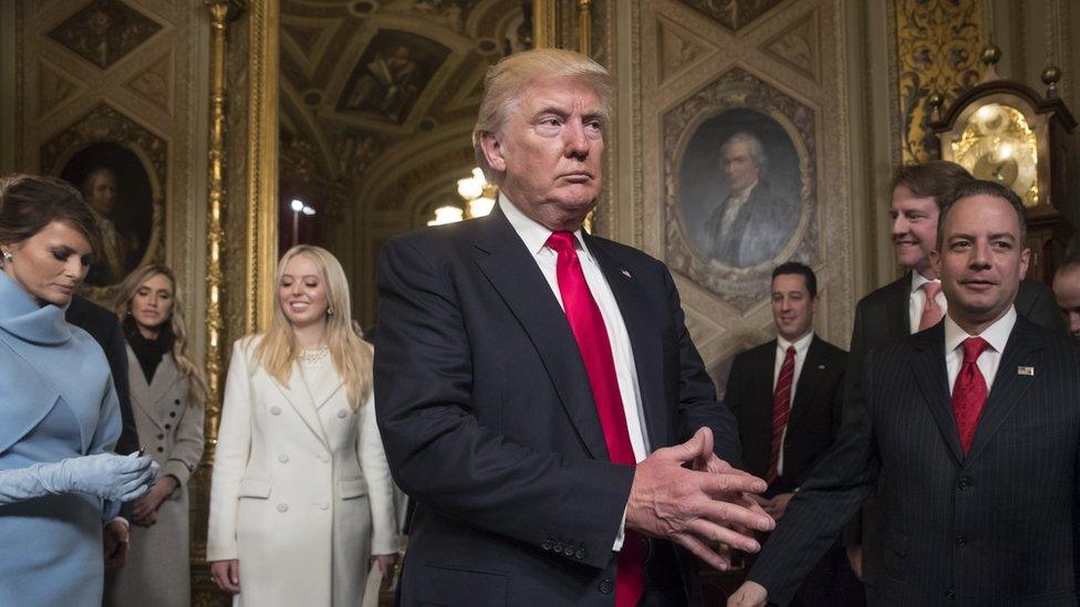 President Donald Trump leaves the President's Room of the Senate at the Capitol after he formally signed his cabinet nominations into law, in Washington, USA. January 20, 2017. He is followed by his wife, and Tiffany Trump.