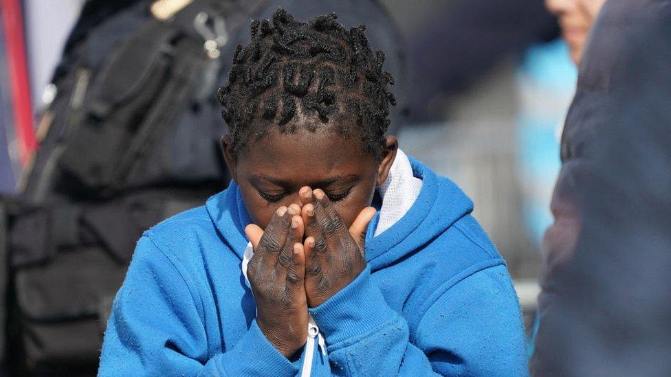 Migrants rescued by Spanish NGO waiting to disembark in Sicily