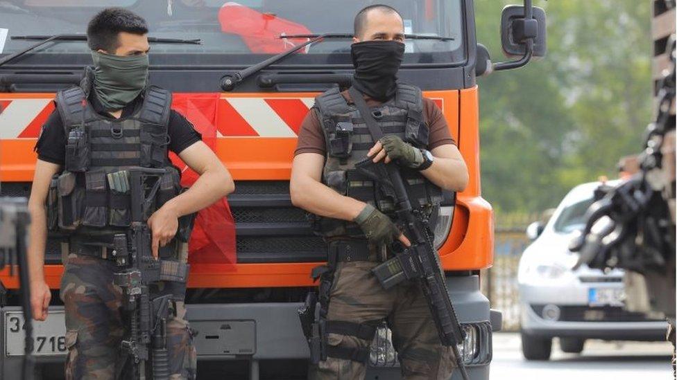 Members of the police special forces stand guard in front of the Air Force Academy in Istanbul, Turkey, July 18, 2016