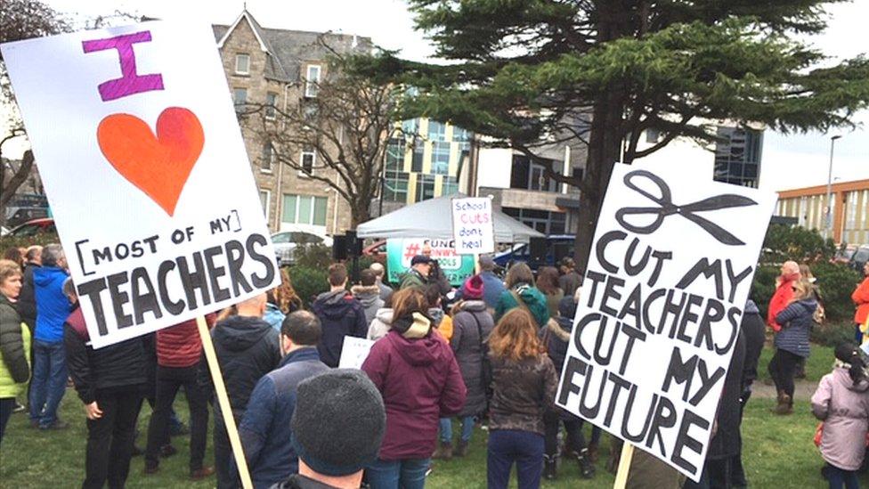 Parents and pupils hold protest over planned education funding cuts in Conwy county