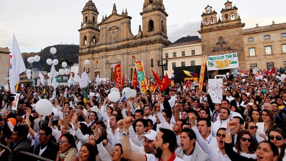 People gather at the Bolivar square outside the cathedral in Bogota, Colombia, September 26, 2016.