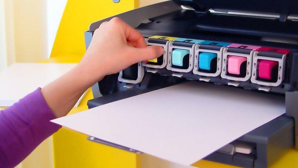 Person fixing printer cartridge