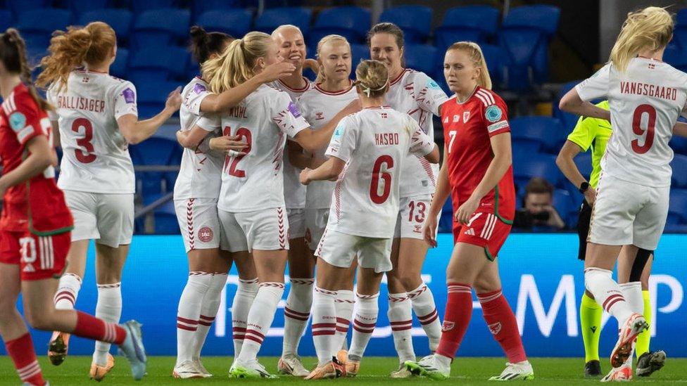 Denmark celebrate after scoring a goal