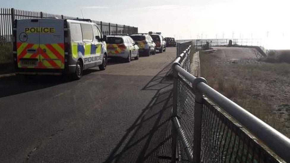 Police vehicles at beach in Skegness