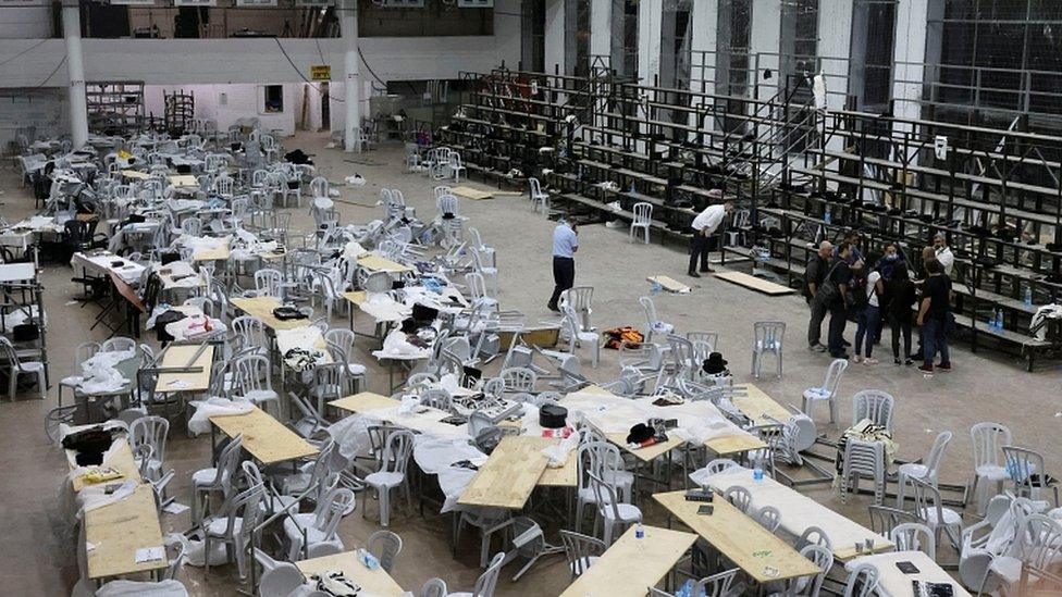 A view inside a synagogue where tiered seating collapsed during a religious celebration in Givat Zeev, in the occupied West Bank, May 16, 2021