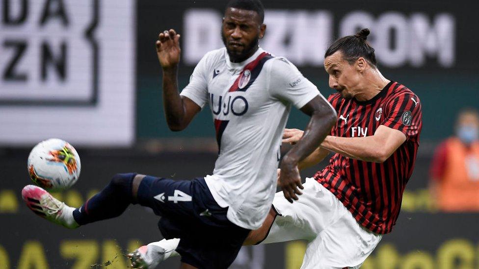 AC Milan's Zlatan Ibrahimovic kicks the ball against Bologna