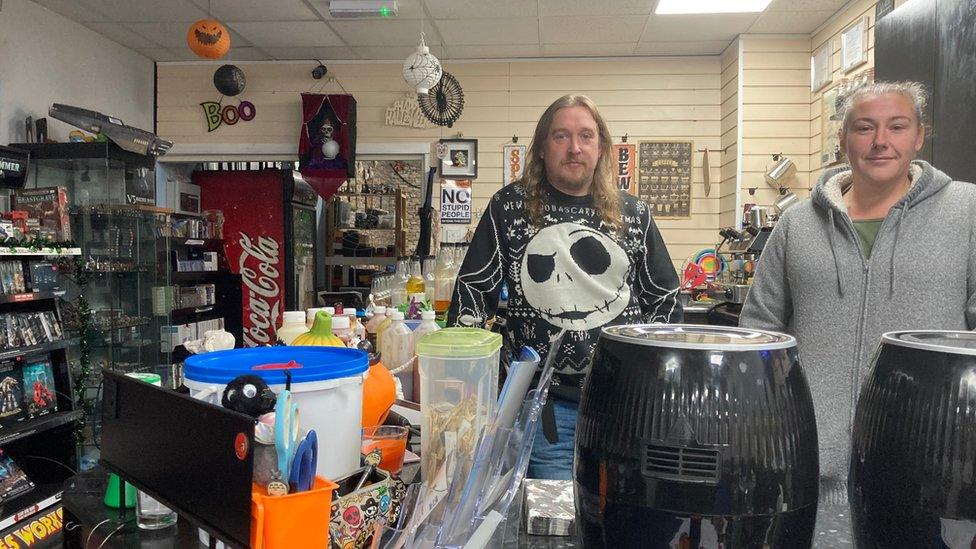 Graham Peacock and Sarah Roach pictured behind the counter at the Game On cafe and gaming venue