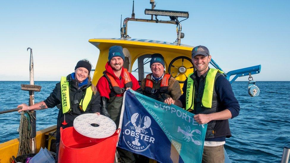 Whitby Lobster Hatchery staff on boat during trip to release lobsters