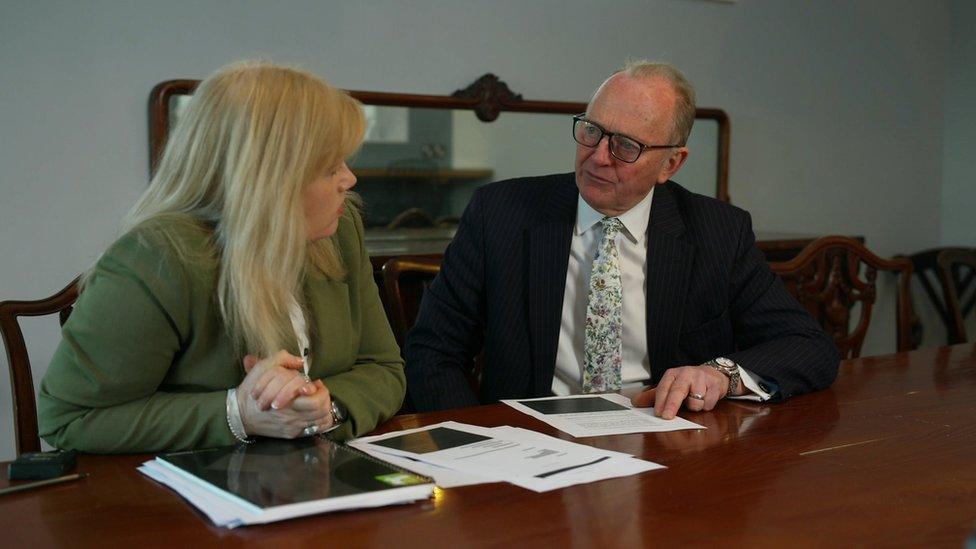 BBC Spotlight reporter Mandy McAuley with Sir Hugh Orde