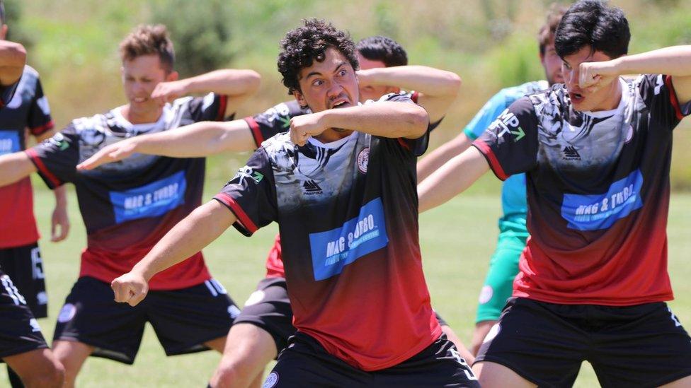 Maori Football Te Ikaroa perform their pre-match haka