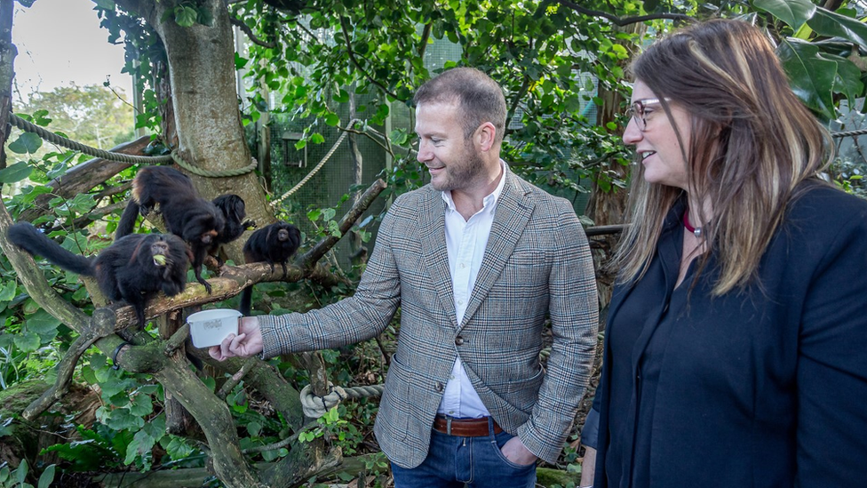 Rob Veron with Dr Lesley Dickie looking at Black Lion Tamarins