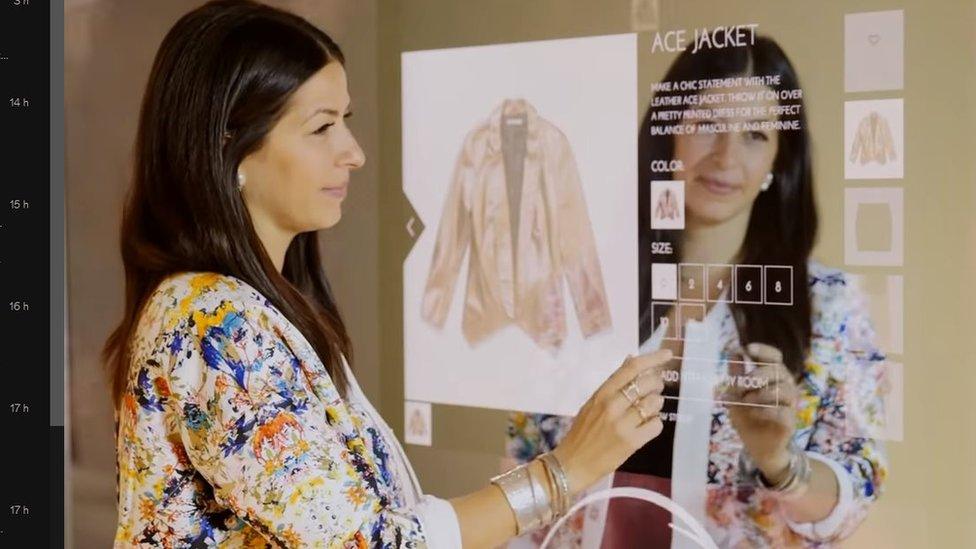 Fashion entrepreneur Rebecca Minkoff shows off one of her interactive mirrors