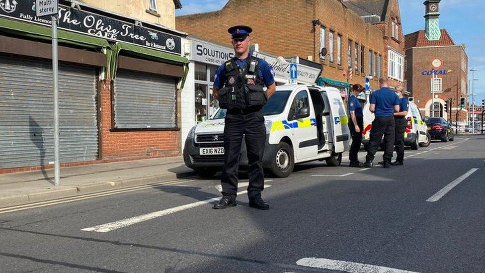 Police officer guarding crime scene in Clacton