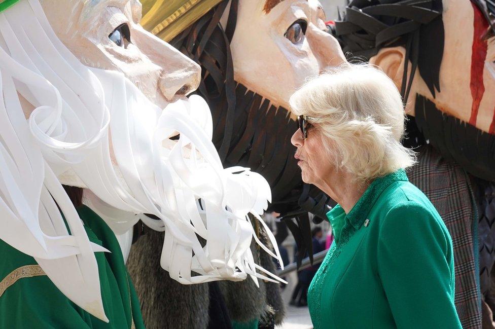 Queen Camilla meet characters representing legendary and historical characters associated with Armagh during a visit to Market Theatre Square, Armagh, Co Armagh as part of a two day visit to Northern Ireland. May 25, 2023.