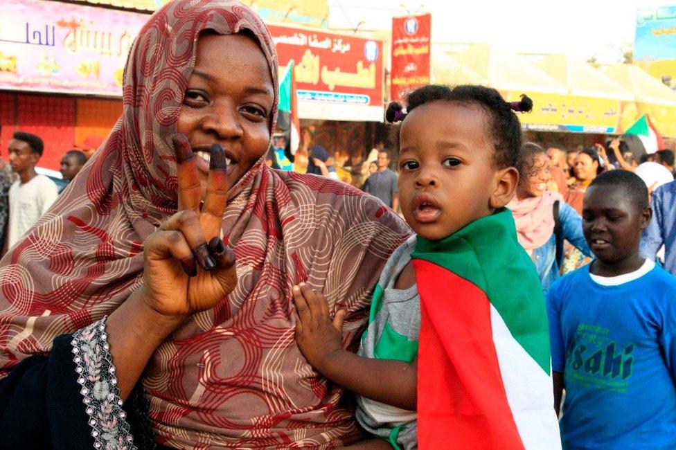 Sudanese protesters are seen in the capital Khartoum's northern district of Bahri on 13 July 2019.