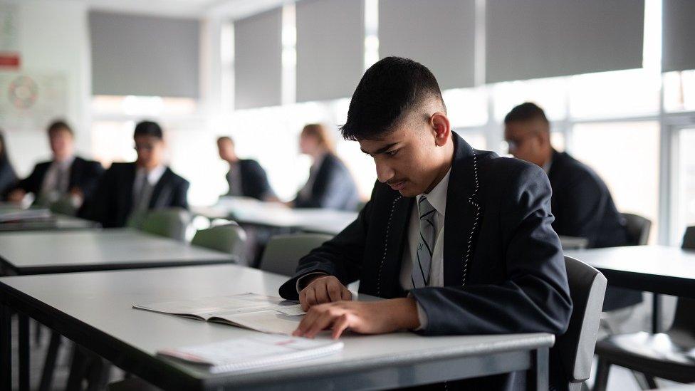 Year 10 pupils attend an English lesson at Moor End Academy in Huddersfield, northern England on September 11, 2020.