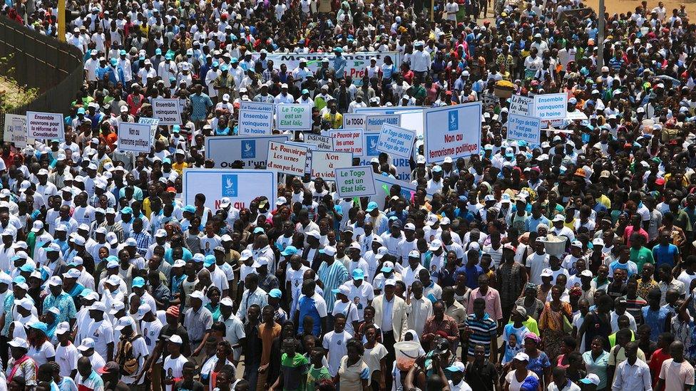 Supporters of President Faure Gnassingbe take part in a march in support of him in Lome, Togo, September 20, 2017