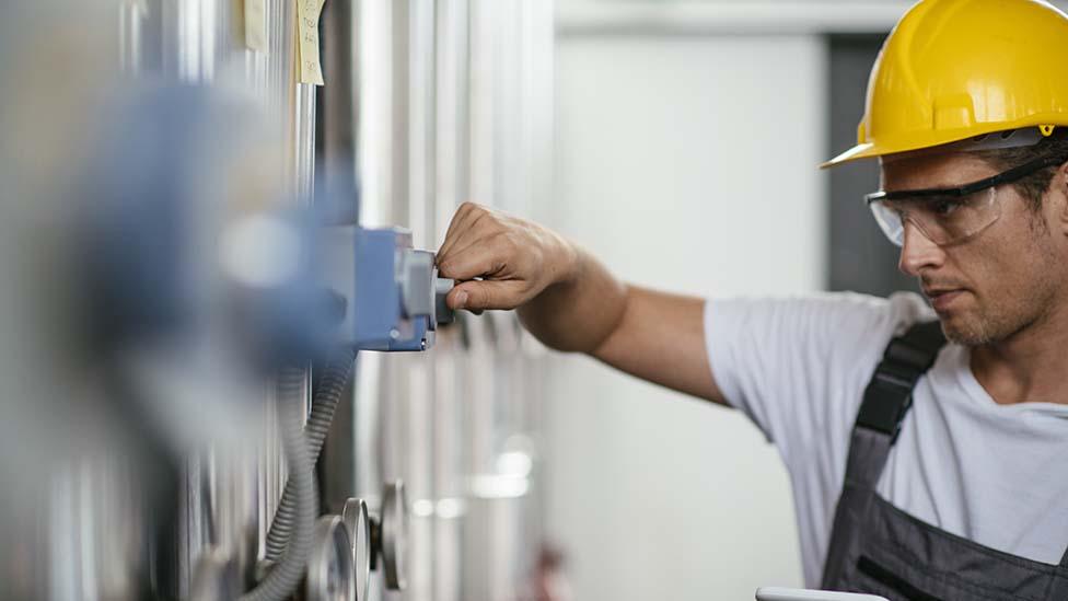 Worker at natural gas plant