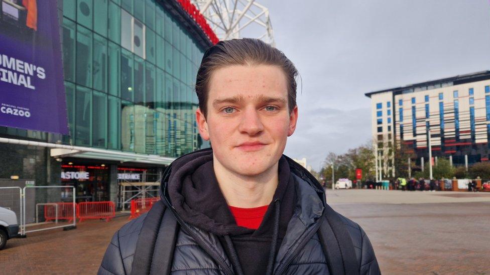 Fan outside Old Trafford Stadium